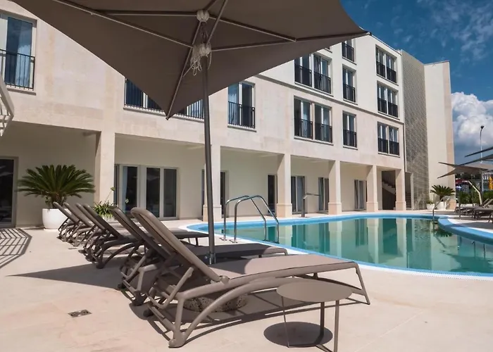 בית הארחה Garden Palace אומאג